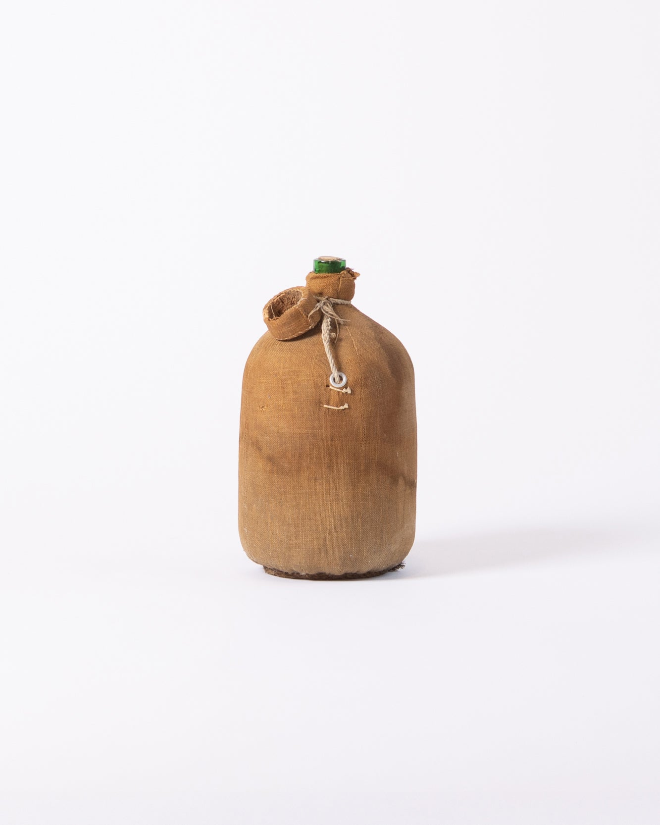 Burlap-covered glass bottle