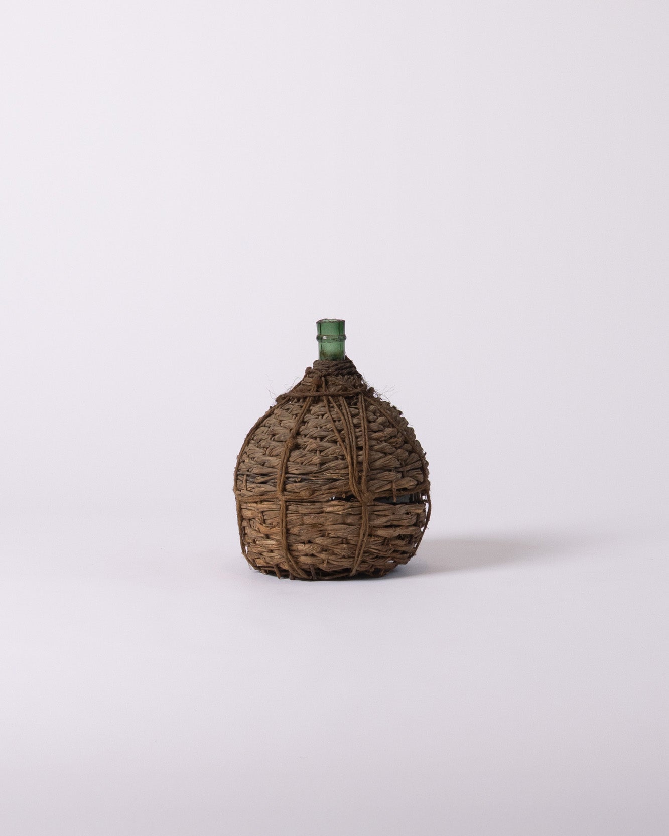 Green glass demijohn