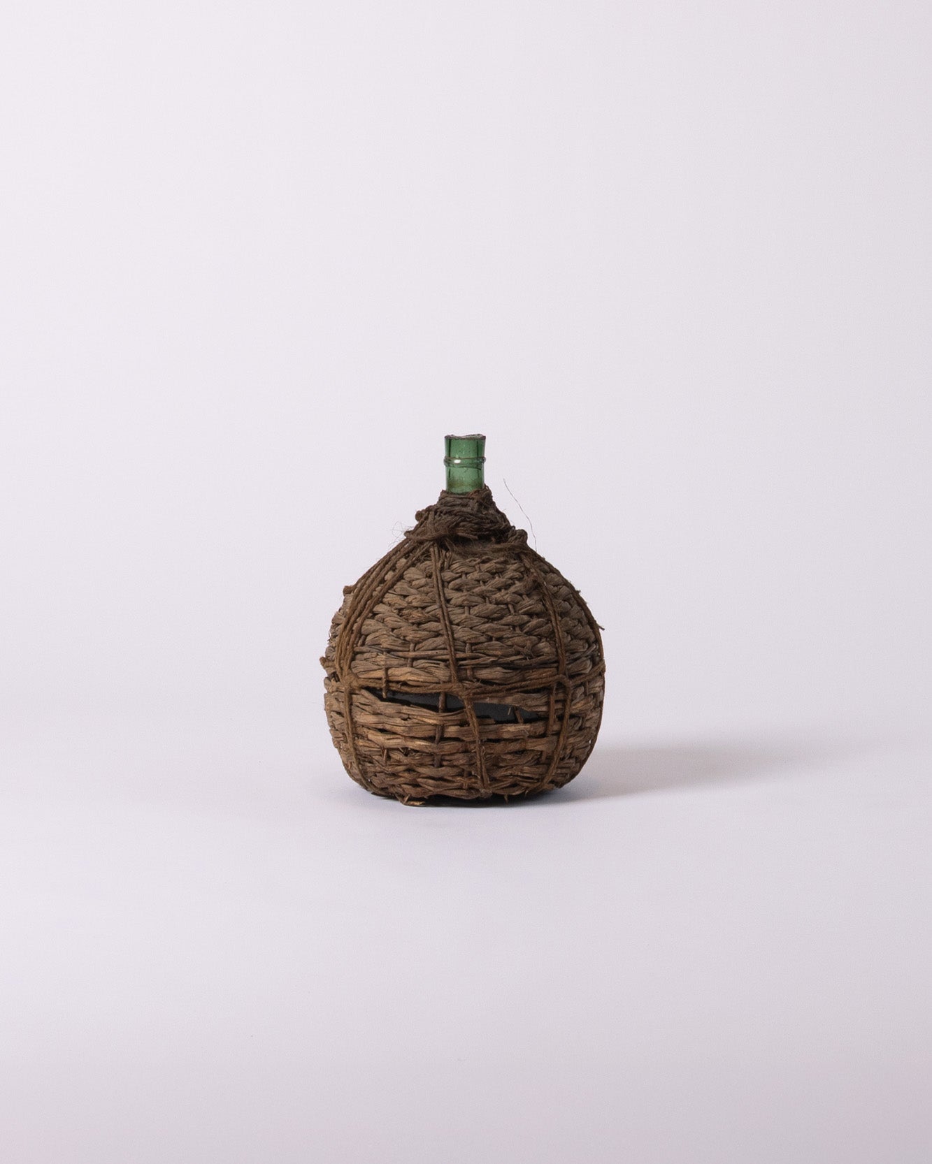 Green glass demijohn