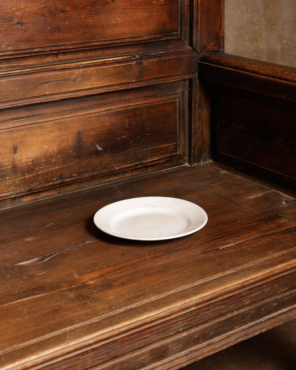 White simple glazed earthenware plate