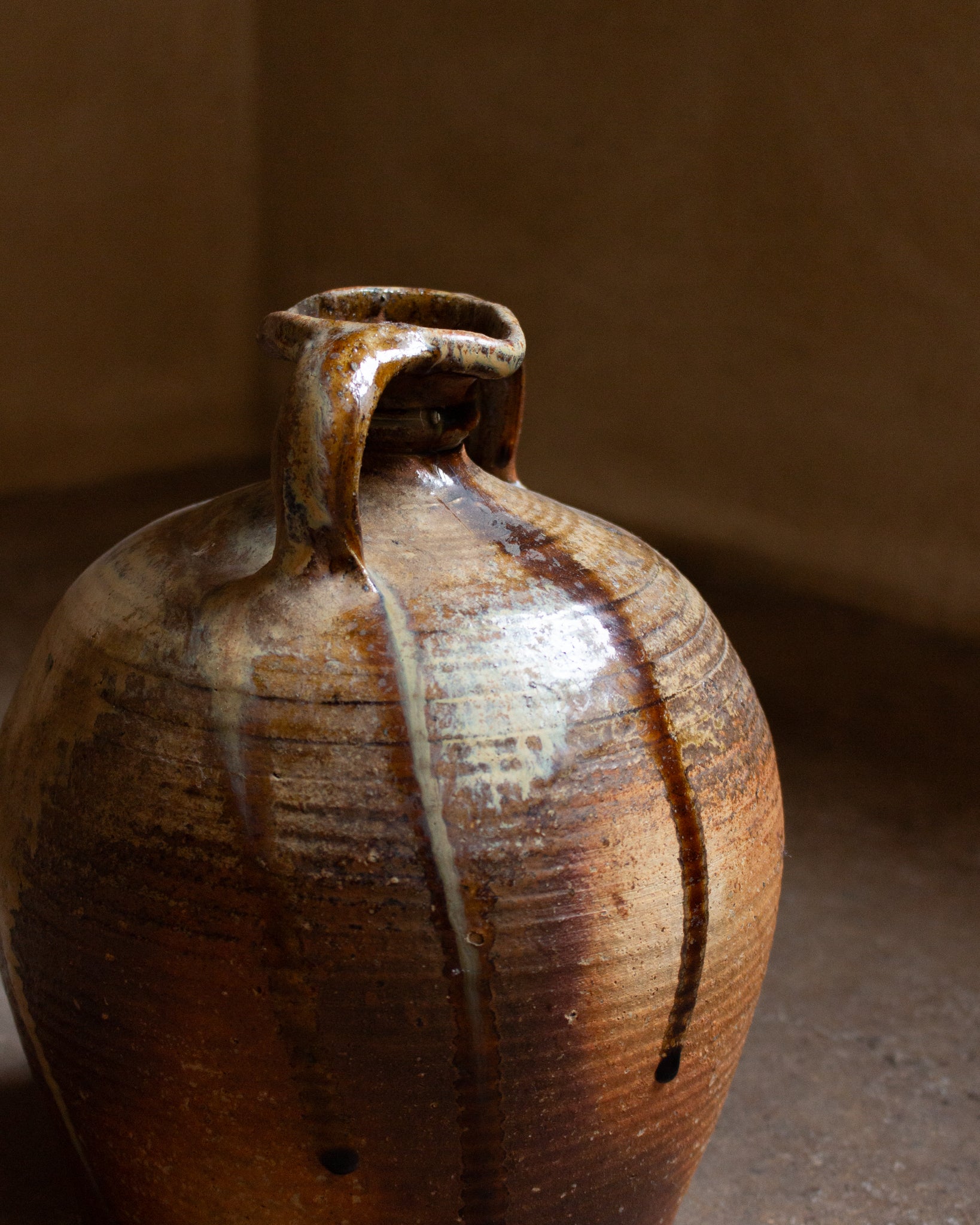 Two-handled stoneware jug