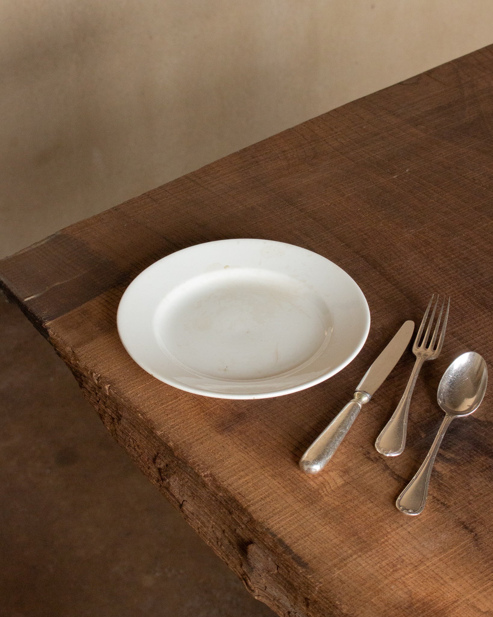White simple glazed earthenware plate
