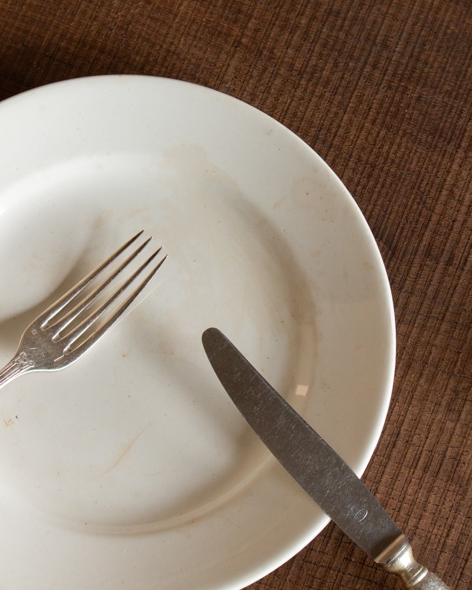 White simple glazed earthenware plate