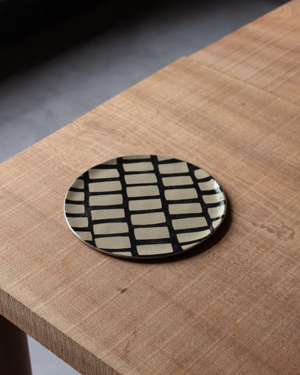 HAAR black inlaid stoneware plate<br>Lydia