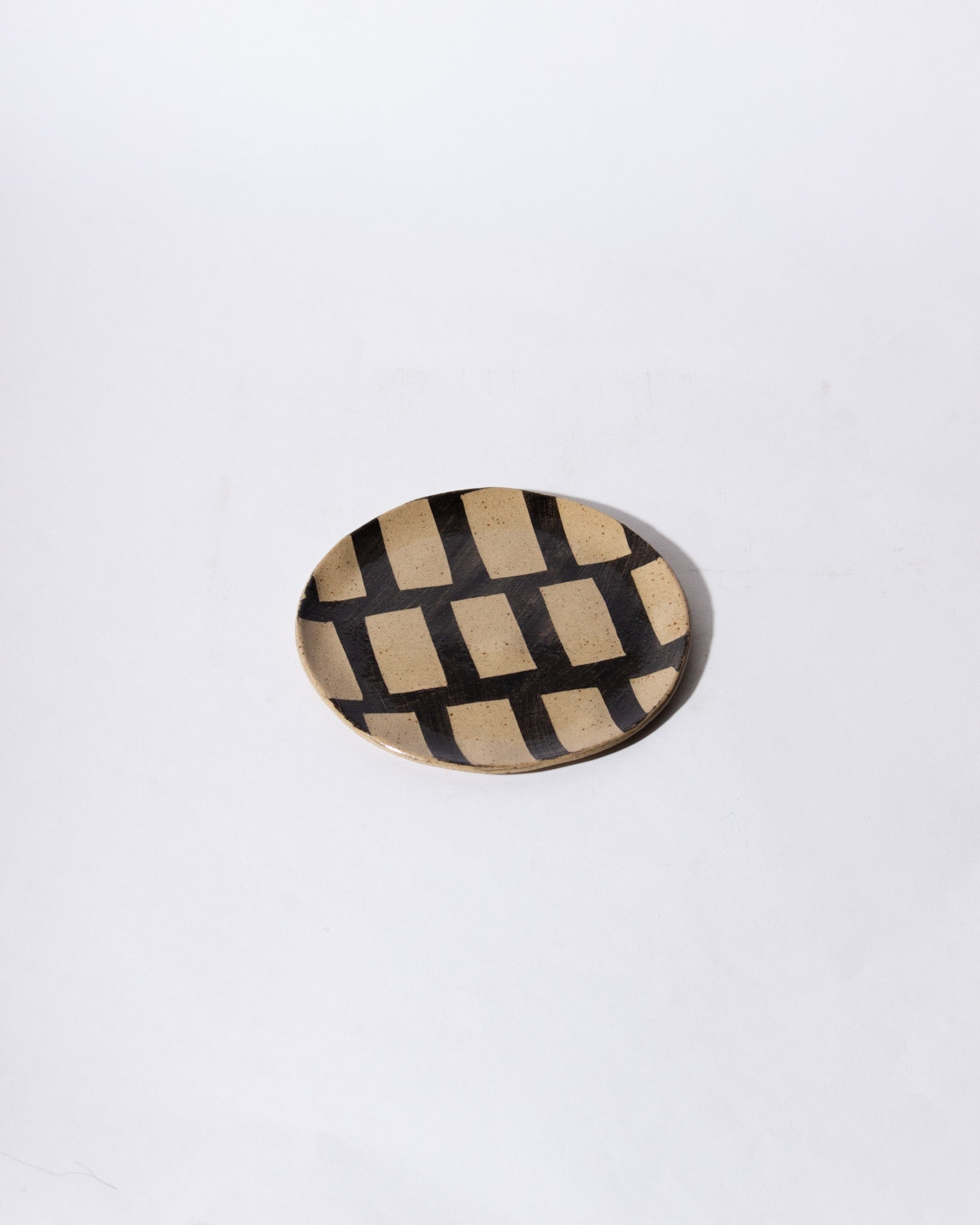 HAAR black inlaid stoneware small plate<br>Lydia